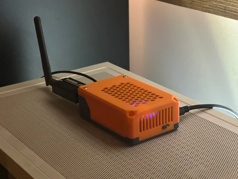 Raspberry Pi 5 in a 3D-printed case with Geekworm X1001 M.2 SSD